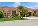 Front view of a two-story house with a two-car garage at 5635 Spanish Point Ct, Palmetto, FL 34221