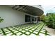 Outdoor patio with fire pit and seating area, perfect for relaxing and entertaining at 107 Elm Ave, Anna Maria, FL 34216