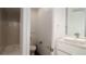 Clean bathroom with toilet, shower, and modern vanity at 107 Elm Ave, Anna Maria, FL 34216