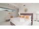 Spacious bedroom with king-size bed and calming decor at 107 Elm Ave, Anna Maria, FL 34216