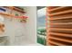 Large closet with shelving and ocean view at 107 Elm Ave, Anna Maria, FL 34216