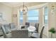 Dining room with bay window offering stunning water views at 920 Tidewater Shores Loop # 405, Bradenton, FL 34208