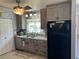 Updated kitchen with stylish cabinets and a farmhouse sink at 4540 Tippecanoe Trl # 183, Sarasota, FL 34233
