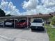 Covered parking with carport for multiple vehicles at 4540 Tippecanoe Trl # 183, Sarasota, FL 34233