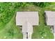 Aerial view of a well-maintained home with a new roof and manicured landscaping at 1705 Curry Ave # 85, Nokomis, FL 34275