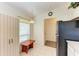 Eat-in kitchen with white cabinets, pendant lighting, and window seating near the entry at 1705 Curry Ave # 85, Nokomis, FL 34275