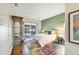 Main bedroom with sliding doors to the pool and a tranquil color scheme at 4300 Timberline Blvd, Venice, FL 34293