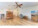 Spacious living room with hardwood floors and a ceiling fan at 1705 Curry Ave # 85, Nokomis, FL 34275