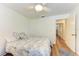 Spacious bedroom with wood-look floors and ceiling fan at 1705 Curry Ave # 85, Nokomis, FL 34275