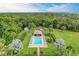 Relaxing community pool with lounge chairs and shaded area at 1705 Curry Ave # 85, Nokomis, FL 34275