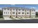 Modern townhome community with attached garages at 9970 Key Haven Rd, Seminole, FL 33777
