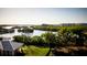 Aerial view of a waterfront community featuring a gazebo and lush landscaping at 9970 Key Haven Rd, Seminole, FL 33777