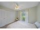 Spacious bedroom with a queen bed and double door closet at 2484 Cover Ln, North Port, FL 34286