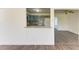 Updated kitchen with granite countertops and blue cabinets at 818 Padgett Ave, Sarasota, FL 34237
