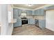 Modern kitchen featuring granite countertops and stainless steel appliances at 818 Padgett Ave, Sarasota, FL 34237