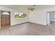 Bright living room featuring wood-look floors and lots of natural light at 818 Padgett Ave, Sarasota, FL 34237