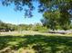 Scenic park with a basketball court, walking path, and lush green areas at 818 Padgett Ave, Sarasota, FL 34237