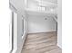Open living area with loft and hardwood floors at 2955 N Beach Rd # A531, Englewood, FL 34223