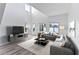 Sophisticated living room with modern furnishings and a large TV at 2955 N Beach Rd # A531, Englewood, FL 34223