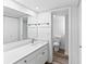 Clean bathroom with white vanity and updated fixtures at 2955 N Beach Rd # A531, Englewood, FL 34223