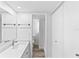 Updated bathroom with modern vanity and flooring at 2955 N Beach Rd # A531, Englewood, FL 34223
