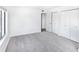 Spacious bedroom with grey carpet and large closets at 2955 N Beach Rd # A531, Englewood, FL 34223