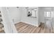Dining area with kitchen access and hardwood floors at 2955 N Beach Rd # A531, Englewood, FL 34223