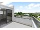 Spacious balcony with partial ocean view and sliding glass doors at 2955 N Beach Rd # A531, Englewood, FL 34223