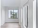 Bedroom with water views and wood-look floors at 2955 N Beach Rd # A531, Englewood, FL 34223