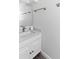 Clean bathroom with white vanity and gray flooring at 2955 N Beach Rd # A531, Englewood, FL 34223