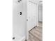 Clean bathroom with shower, toilet and updated flooring at 2955 N Beach Rd # A531, Englewood, FL 34223