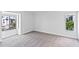 Bright bedroom with ample natural light and neutral carpeting at 2955 N Beach Rd # A531, Englewood, FL 34223