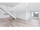 Bright living room with hardwood floors and a loft view at 2955 N Beach Rd # A531, Englewood, FL 34223
