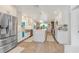 Updated kitchen with stainless steel appliances and island at 3502 Bahia Vista St, Sarasota, FL 34239