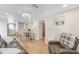 Bright dining area with table and chairs, near kitchen and living room at 3502 Bahia Vista St, Sarasota, FL 34239