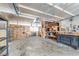 Well-lit garage with various tools and storage at 3502 Bahia Vista St, Sarasota, FL 34239