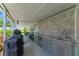 Covered patio features an outdoor kitchen and granite countertop at 3502 Bahia Vista St, Sarasota, FL 34239