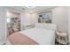 Bright bedroom with a double bed and access to the bathroom at 3502 Bahia Vista St, Sarasota, FL 34239