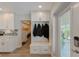 Convenient entryway with built-in bench and coat hooks at 3502 Bahia Vista St, Sarasota, FL 34239