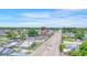 An aerial view of the property and its location in the neighborhood at 3502 Bahia Vista St, Sarasota, FL 34239