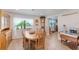 Formal dining room with wood table and hutch at 3502 Bahia Vista St, Sarasota, FL 34239