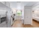 Clean and efficient kitchen with stainless steel appliances and white cabinets at 3502 Bahia Vista St, Sarasota, FL 34239