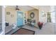 Cozy screened porch with seating area at 3502 Bahia Vista St, Sarasota, FL 34239
