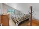 Charming bedroom with a comfy bed and wooden accents at 3502 Bahia Vista St, Sarasota, FL 34239