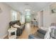 Open living room and dining area with hardwood floors at 3502 Bahia Vista St, Sarasota, FL 34239
