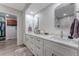 Double vanity bathroom with a walk-in shower and ample storage at 3502 Bahia Vista St, Sarasota, FL 34239