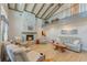 Spacious living room with high ceilings, fireplace, and loft at 3502 Bahia Vista St, Sarasota, FL 34239