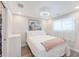 Cozy bedroom with a comfortable bed and a large picture on the wall at 3502 Bahia Vista St, Sarasota, FL 34239