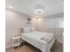 Comfortable bedroom with a queen bed and a side table at 3502 Bahia Vista St, Sarasota, FL 34239