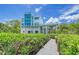 Walkway to waterfront home at 5444 Gulf Of Mexico Dr, Longboat Key, FL 34228